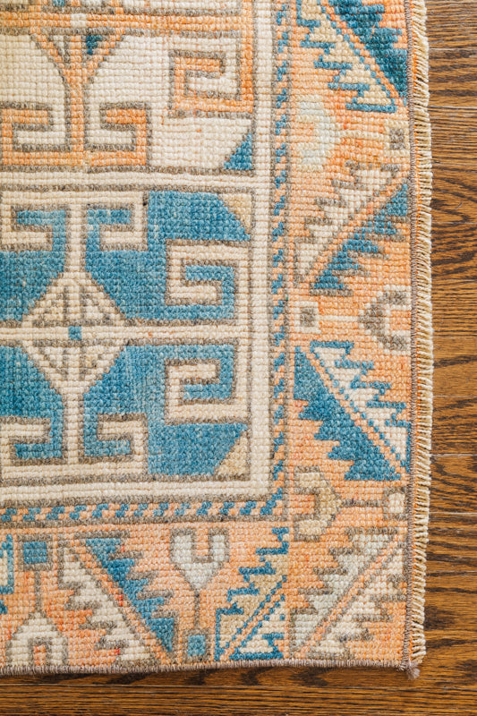 Vintage Turkish Rug (Tan, Blue, and Orange)